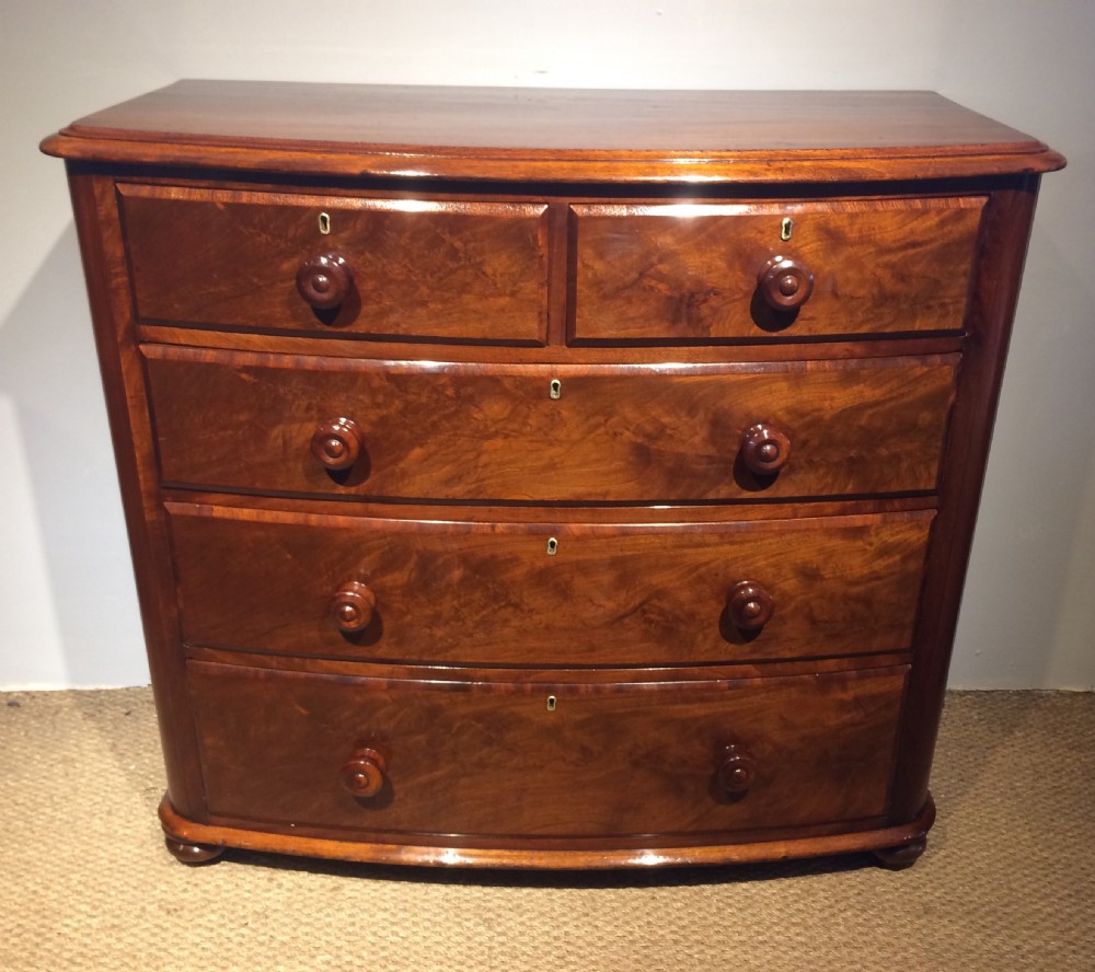 mahogany bow front chest of drawers