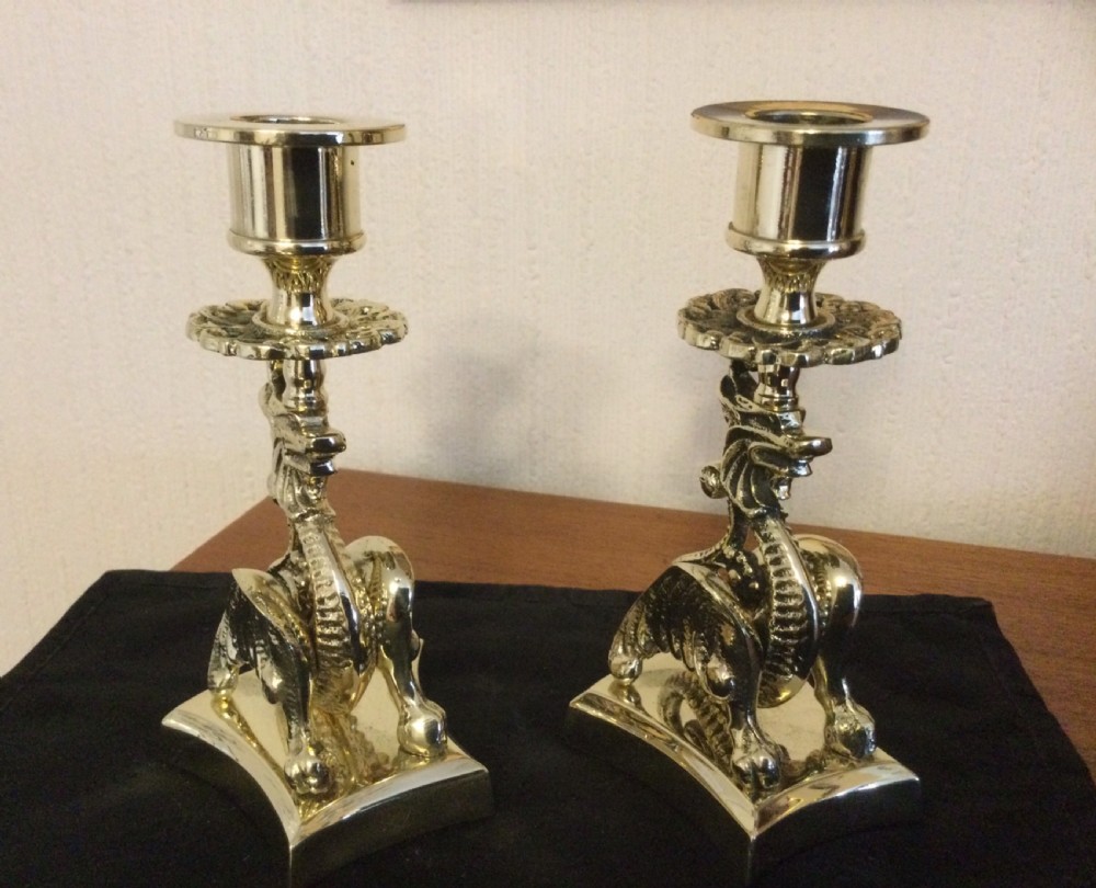 pair brass griffin candlesticks